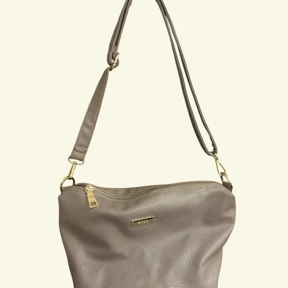 BCBG Paris Black and Tan Tote Bag with matching crossbody purse - Picture 2 of 4